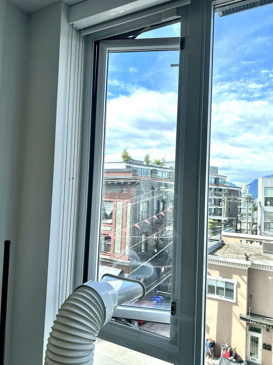 Number2Onion's tweet photo. @HSsai @sleepy_devo A lot of people in North America also don't have windows that fit their AC units. So they do things like this, with the window kept fully open. Clear options like plexiglas are available too if you want. https://t.co/xSTM2gwlZz