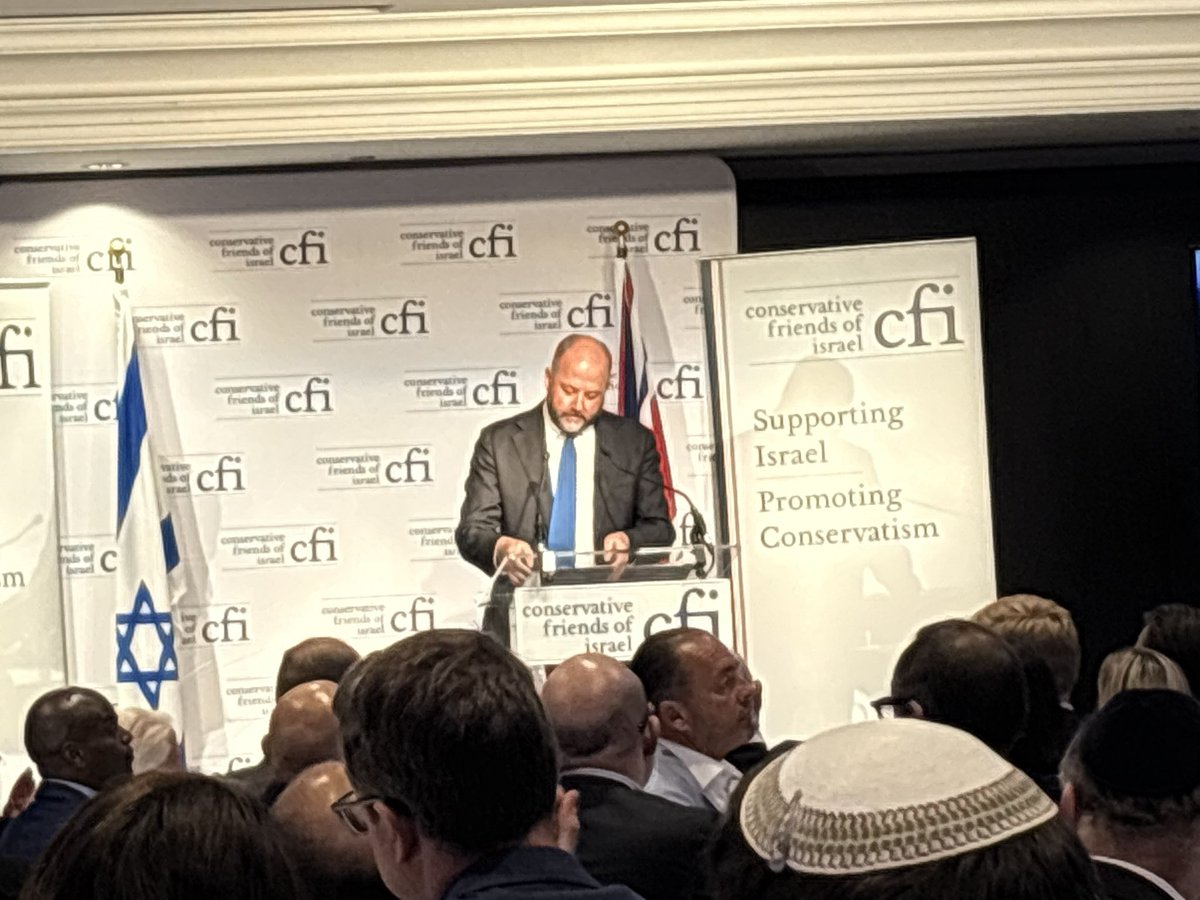 nicolelampert's tweet photo. MP @NJ_Timothy gave a very good speech at Conservative Friends of Israel event. 
Here is one portion where he talked about the Maccabi Tel Aviv scandal which he played a big part in exposing:

‘The police had intelligence that local Islamists were planning to arm themselves and attack the visiting Israelis, but the police covered that up. 
Instead, they fabricated intelligence that presented the Israelis as uniquely violent and a danger to innocent fans. 
The police lied to the Home Affairs Committee but we never gave up, and the Chief Constable, Craig Guildford, was forced out.
‘People ask me, how on earth this happened, but I don't believe Craig Guildford is an anti-Semite who wants to go after Israelis. 
The truth is actually far worse. 
The police faced political pressure, and they faced a serious threat from extremists. They judged that they'd be unable to control the streets, and so they surrendered, and yet it was even worse than that. 
Our campaign found disturbing connections between the police and local extremists. 
Green Lane Mosque in Birmingham is known by the police and others to be a serious problem. It's where the head imam gave a sermon on how to correctly stone a woman to death, but we found the police had held a recruitment fair there, and when Craig Gilbert was appointed chief constable, a mosque representative had sat on the interview channel. 
This is how the logic of communalism, where ethnic and religious identities come before the common good, and it corrupts the police. 
They never  consciously decided to become anti-Semitic, believing in Robert Peel's maxim that the police are the public and the public are the police. 
They wanted to be a part of the community, but that noble idea gave way to the logic of multiculturalism and a kind of community corporatism, and that gave way to the corrupting effects of community. 
The fraud followed, and the police found themselves outsourcing their decisions to community leaders making themselves the willing tools of anti-Semites and lying to parliament about doing so. Justice was replaced by injustice. Equality before the law was lost to ethnic oversightism. 
If we think this is limited to the West Middle East, or it begins and ends with policing, we're deluding ourselves. 
From local councils to the most sensitive government departments, from the breakdowns to the Saturday marches, our institutions are being corrupted and the power of the states is being used to pursue excellent sectors, and if we think this is only about Israel or only about Jews, we're deluding ourselves about that too, because this intolerance, this hatred of others will come for all of us.’
