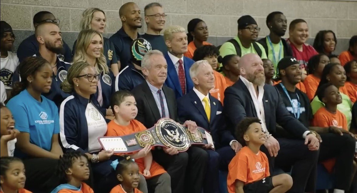 Cory_Hays407's tweet photo. Austin Theory, Charlotte Flair, Byron Saxton, Cody Rhodes, Rey Mysterio, Triple H, and Robert F Kennedy at the Boys and Girls Club Atlantic City today #WWERAW https://t.co/4ryoxs4KNT