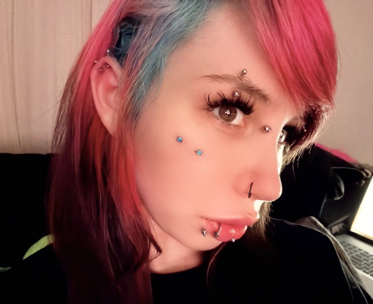 kiwithesmol's tweet photo. more piercing setup selfies :3 i changed my anti-eyebrow jewelry to blue to match my hair! and i got a new piercing (my nose bridge, and then i got 2 vertical helix in my ear!) but i looove the blue jewelery matching my hair, it’s a nice cute touch to the rest of my jewelery being silver! ALSO got me new nails done! 💅