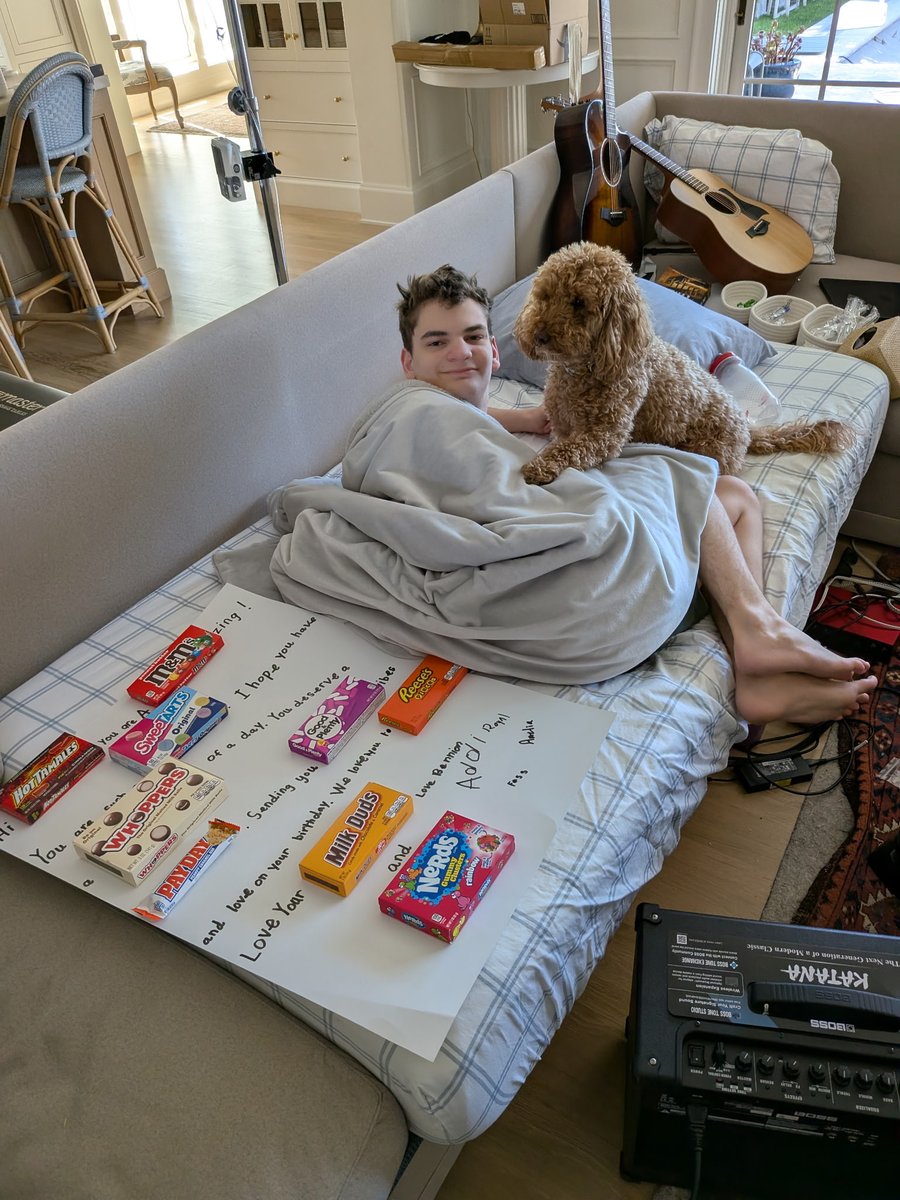 royalhansen's tweet photo. He turns 16 today. We're lucky to have family to come visit but he should be getting a driver's license and at a sports camp this summer. Instead, he's lying down with the dog #longcovid #mecfs https://t.co/9EVK6qo2gM