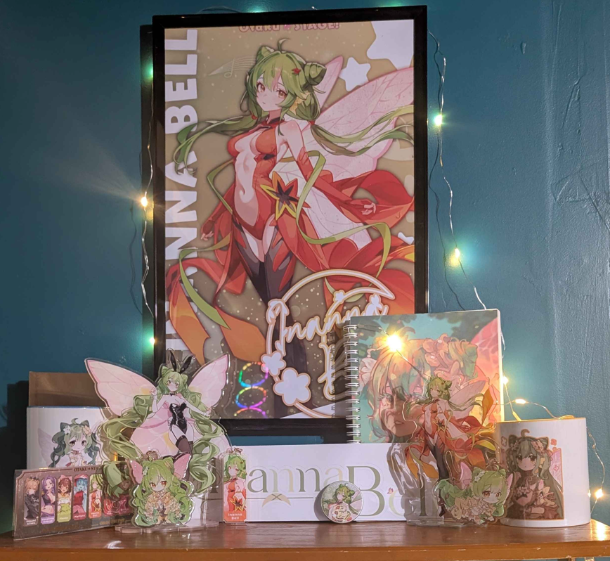 Starpii's tweet photo. I finally got my @InannaBellVT Shrine set up :3 I always adore all her merch! 
🩷💚 https://t.co/oufLN1lLV2