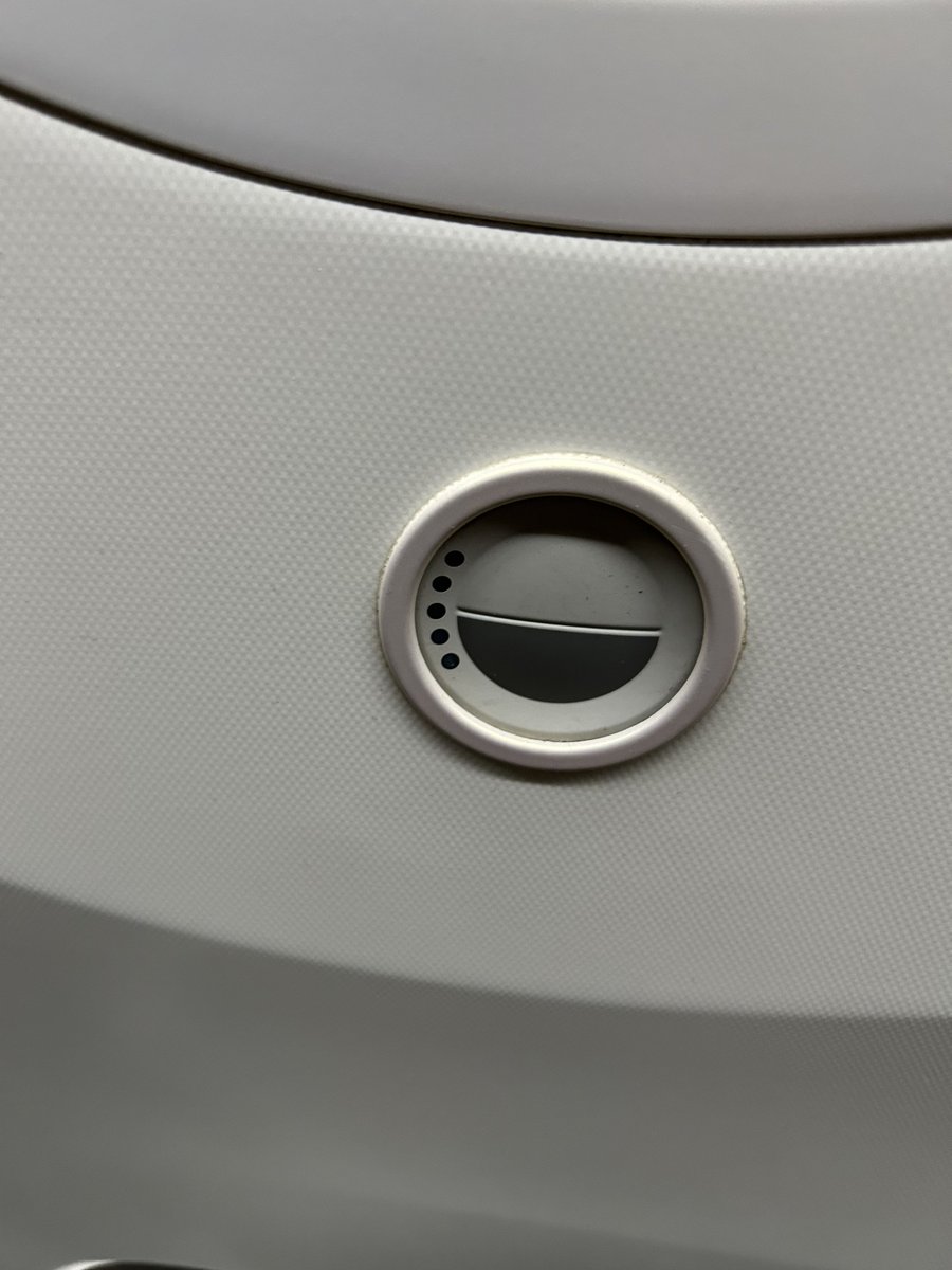 Fahadnaimb's tweet photo. We often replace these electrical dimmable window push buttons on B787. 
They control the electrochromic windows... you press to tint the glass darker, but the change is slow. Many passengers keep pressing because they think it's not working. This wears the button out fast.
Replacements aren't cheap.