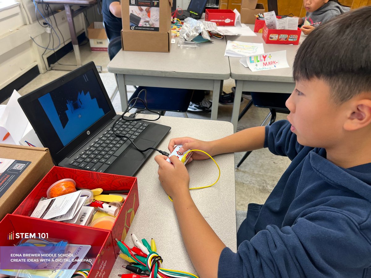 STEM101's tweet photo. Students at Edna Brewer Middle School are exploring how technology responds to the world around it.

Using the Create Ideas with a Digital Gamepad kit, they're building their own controllers and learning the principles that make them work:

✅ How switches open and close a circuit
✅ How different materials conduct electricity
✅ How a physical input can produce a digital response on screen.

Each design gives them room to experiment, test, and refine until it works.
These are foundational skills in electronics and engineering, applied through hands-on problem-solving.

Want your students learning like this? Explore the kit at https://t.co/oHdN471tWu.

#STEMforKids #HandsOnLearning #FutureEngineers #STEM101