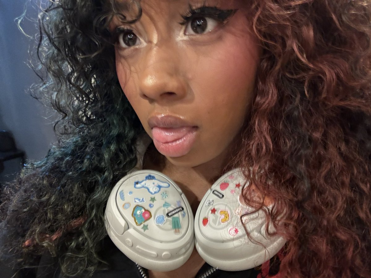 abomaton's tweet photo. showing off my nowz headphones again https://t.co/WHPackPUBX