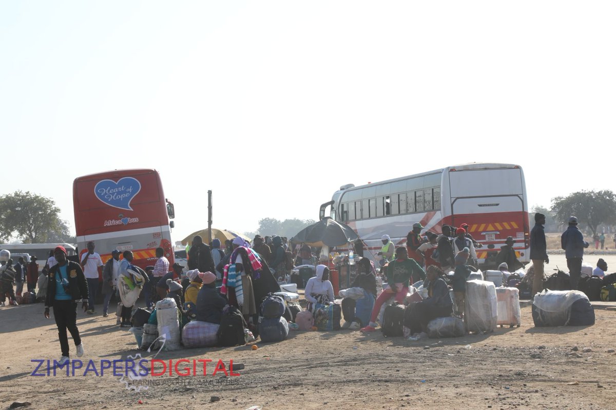 HeraldZimbabwe's tweet photo. Some Zimbabweans who were based in South Africa are finding their own way home. Here, they are seen waiting for transport in Beitbridge this morning. However, most buses are taking advantage of the situation and have increased fares. 
📸 : Edward Zvemisha https://t.co/wgHZzAEx9Q