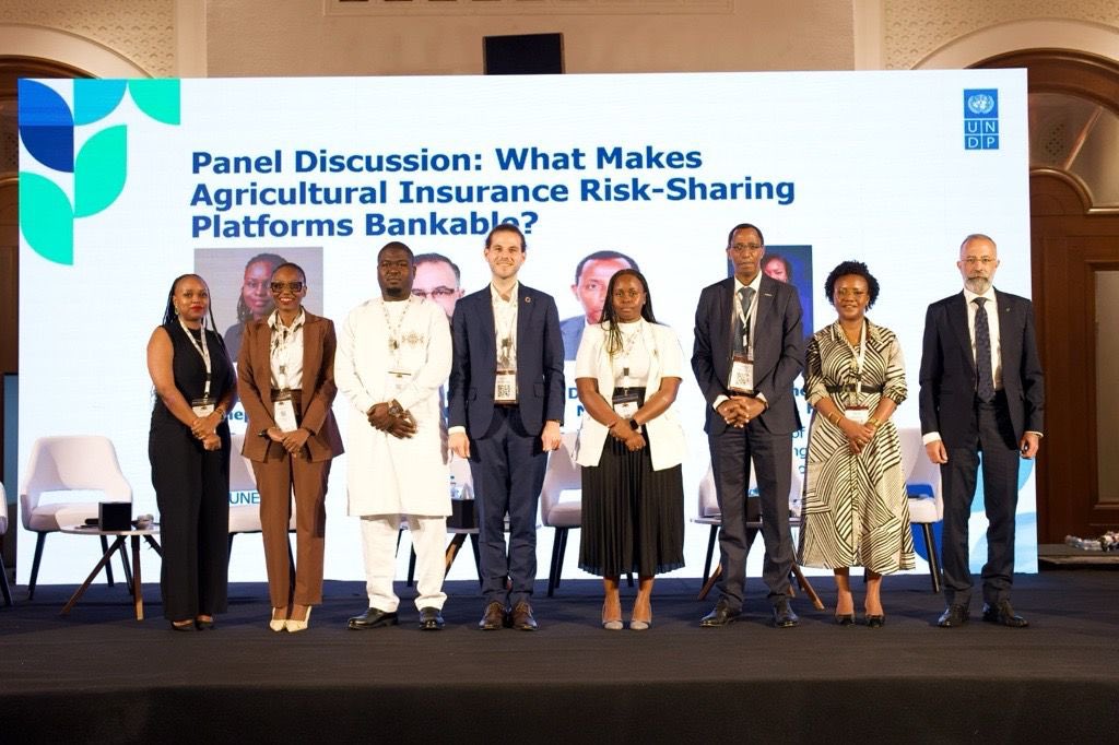 AgroConsortium's tweet photo. Looking back at the 2026  @AIOSocialMedia  Confrence in Cairo 🌍

Agriculture insurance took centre stage at #AIO2026, as leaders from across Africa gathered under the theme "Insurance as an Enabler of Economic Growth for All."

The discussions reinforced a shared reality;-while agriculture remains the backbone of African economies, climate risk and low insurance penetration continue to limit its full potential. 

We were proud that @AgroConsortium contributed to these powerful conversations.

We  joined a high-level panel on "Innovative Insurance Solutions for Agricultural Growth in Africa." sharing Uganda’s practical experience under the Uganda Agriculture Insurance Scheme (UAIS), focusing on what it takes to move from design to a functioning, scalable system that farmers trust and use.

From Uganda’s implementation journey, three lessons stood out:

🌱 Trust is built at the point of delivery. Agriculture insurance only becomes meaningful when farmers consistently experience timely communication, transparent processes, and credible claims handling through a coordinated implementation structure.

🤝 Scale depends on embedding, not reinventing systems. In Uganda, the most effective distribution has come through integration with existing ecosystems banks, SACCOs, cooperatives, aggregators, and value chain actors already working with farmers.

📊 Systems matter as much as products. Moving toward national-scale agriculture insurance requires strong policy frameworks, reliable climate and agricultural data systems, coordinated public-private action, sustainable financing, and continuous institutional learning.

What stood out most in Cairo was the convergence of thinking across countries;- agriculture insurance is no longer viewed in isolation, but as part of broader resilience and food security systems.

As AIC, we remain committed to contributing Uganda’s implementation experience to these continental dialogues, while working closely with the Government of Uganda, insurers, development partners, and ecosystem partners to expand access to inclusive and scalable agriculture insurance solutions.

We also acknowledge the collaboration with  @UNDP_SDGFinance Insurance and Risk Finance Facility (IRFF), whose support continues to strengthen evidence, innovation, and learning within Uganda’s agriculture insurance ecosystem.

📸Swipe through for highlights from Cairo;- an inspiring week of dialogue, learning, and collaboration shaping the future of insurance in Africa.🌍

#AIO2026 #AgriculturalInsurance #ClimateResilience #Insurance #FinancialInclusion #PublicPrivatePartnerships #FoodSecurity #Innovation #Uganda #Africa