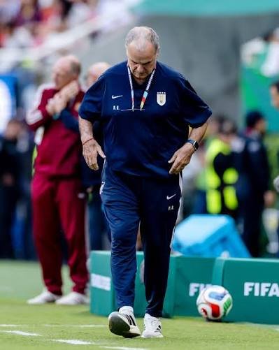 gonzalorusso's tweet photo. Bielsa did not fail because he tried to change the identity of Uruguayan football.

He failed because he tried to change a paradigm that many people mistake for identity.

And that is where the real problem begins.

In Uruguay, grit, history and the pride of being "el paisito" — a country of barely three million that has never allowed itself to feel small — have often been a driving force. They push us. They give us character. They make us believe we can compete with anyone.

But they can also become a shelter.
Because having an identity is one thing. Using it as an excuse not to evolve is something very different.

“Somos tres millones.”
“This is Uruguay.”
“Nobody gives us anything.”
“Against the world.”
“Knife between the teeth.”
“Going where others would not dare put a boot.”

All those phrases carry enormous emotional power. They are part of the Uruguayan football soul.

But when that narrative starts replacing method, planning, self-criticism and modernisation, it stops being a virtue and becomes a limit.

Bielsa touched that nerve.

He did not come to tell Uruguay to stop being Uruguay. He came to say that history alone is no longer enough. Garra alone is no longer enough.

The world has changed, and you cannot compete against modern football structures by believing that bravery, hard tackles and fierce looks will still win the day.

That is when the resistance kicked in.

But it would also be unfair to place all the responsibility on Bielsa, as if the players had simply been victims of the process.

Because another uncomfortable part of the problem appeared there too: some players were not only resisting a tactical idea. They were resisting a level of demand.

They resisted intensity, discomfort, the loss of certain privileges, changed habits and a methodology designed not to please them, but to push them to their competitive limit.

And that, too, is part of the paradigm.

From what has come out publicly, the conflict was not only about how Uruguay played. It was also about how they trained, how they lived together, how leadership was managed, and how willing the players were to accept a form of authority that was never designed to make them comfortable.

Bielsa may have got things wrong in the way he handled it. Almost certainly. He may have mismanaged sensitivities, timing and senior players.

But the deeper issue remains the same: he tried to install a culture of training, demand and method that not everyone was prepared to accept.

And that leaves another uncomfortable question:

Does Uruguay really want to compete with the world’s elite, or does it want to keep the comforts it has always known?

Because you cannot ask to become a force on the world stage again while rejecting the cost of training, living and competing like the world’s elite.

Uruguayan football wants to grow, but often without the discomfort that growth demands. It wants to return to the top, but without questioning its habits. It wants to compete with the best, but without abandoning certain stories that protect it from looking itself in the mirror.

And Bielsa, with all his mistakes, forced Uruguay to look.

Perhaps his failure was not only a footballing one. Perhaps it was cultural.

He tried to push Uruguay towards a more modern, more demanding and less self-indulgent version of itself, but he collided with an ecosystem that still feels that changing means betraying who you are.

It does not.

Evolving is not ceasing to be Uruguay.
Modernising is not losing the garra.
Changing the paradigm is not erasing history.

The real problem is still believing that the shirt, and the history behind it, can win matches by itself.

Because garra without evolution eventually becomes nostalgia.

And nostalgia does not compete.

It only remembers.

@LUFC 
@JimenaJuani 
@BBCLeeds 
@martitabaires
