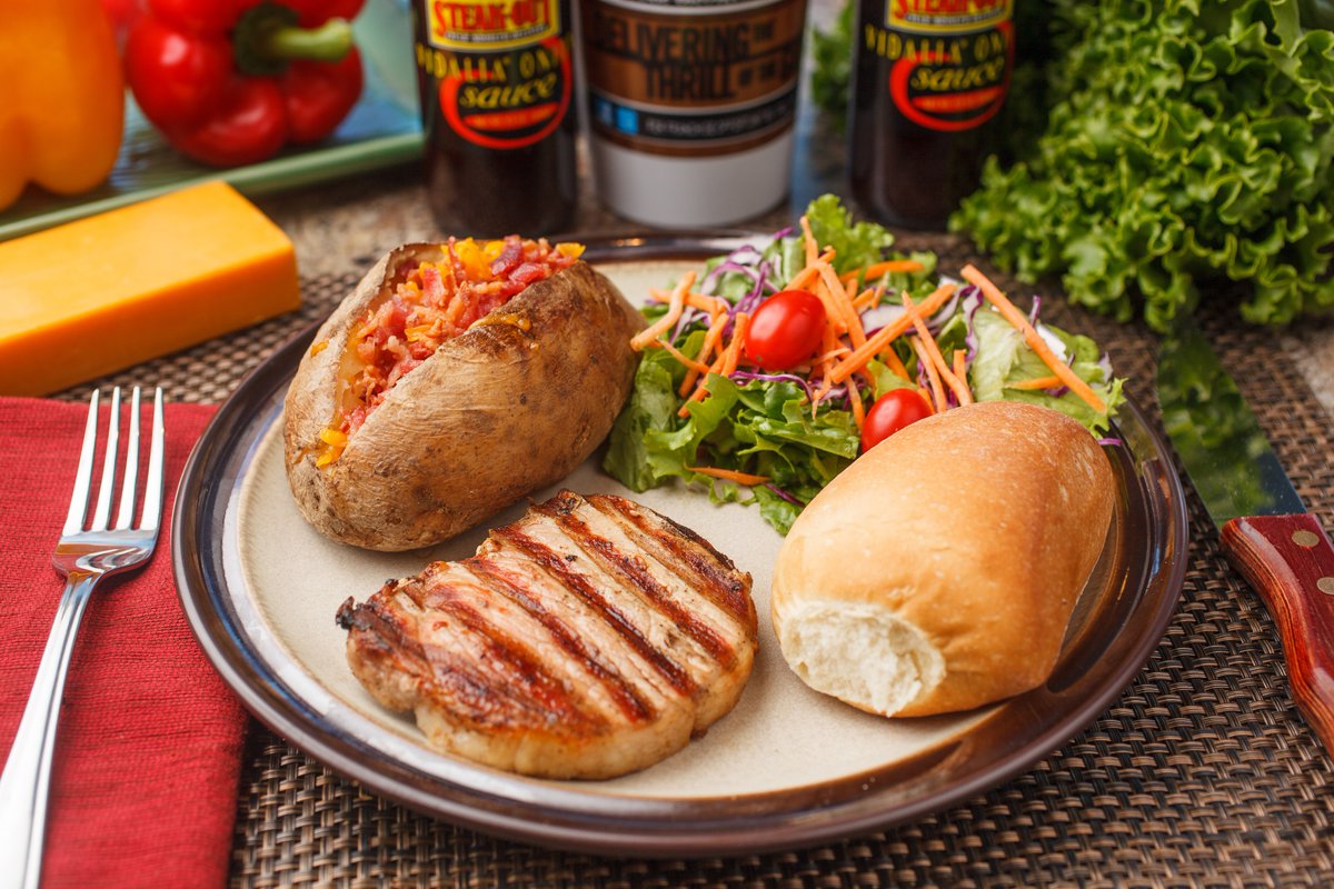 SteakOutBham's tweet photo. Want an incentive to pick up your meal? Every lunch or dinner entrée includes a tea when you stop by to pick it up! https://t.co/by66MnPrtu #porkchop https://t.co/JU84rI34Tj
