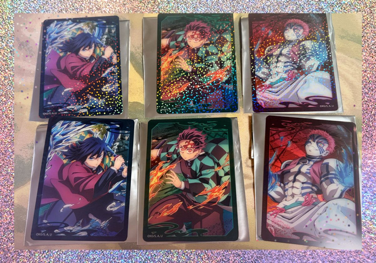 murami_TL's tweet photo. 今回は缶バは我慢してクリアカード買いまして。ランダムもイヤなので箱で買いました📦上段がホロですキラキラ✨
猗窩座は譲渡に出しますね。 https://t.co/XNW2owOrIM