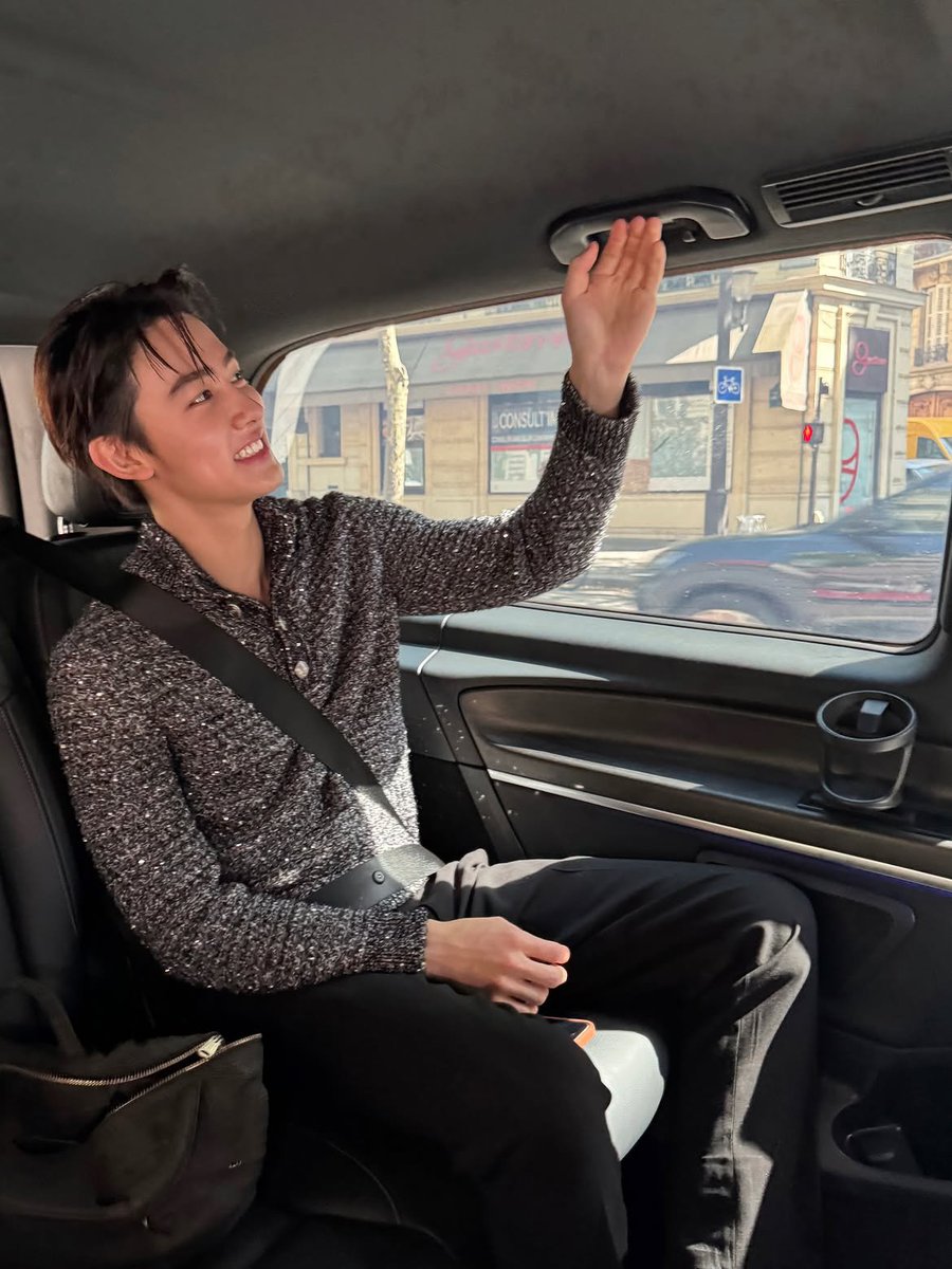 Sfonghyeon's tweet photo. Passenger seat diaries. Waving at the city, lost in my phone, then watching Paris in golden light. No rush, no noise. Just me, sunlight, and a quiet I want to remember. https://t.co/4soXpYrt8U
