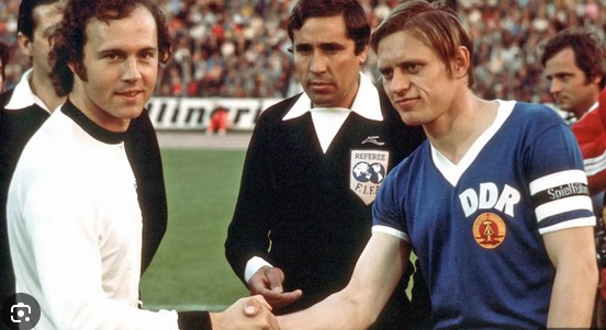 MatthiasHartel's tweet photo. Als die DDR die Bundesrepublik bei der WM 1974 besiegte

Zitat: "Wenn man auf meinem Grabstein eines Tages nur 'Hamburg '74' schreibt,  weiß jeder, wer da drunter liegt" 

Jürgen Sparwasser

Aber was ist dran, an dem Gerüchte das sich bis heute hält, das Schön die DDR absichtlich gewinnen lies, um etwa Brasilien in der Folgerunde zu vermeiden?

Spielte die BRD - Elf mit angezogener Handbremse und eher vom DDR Tor weg, wie auch immer gesagt wird?

Was meint ihr?
