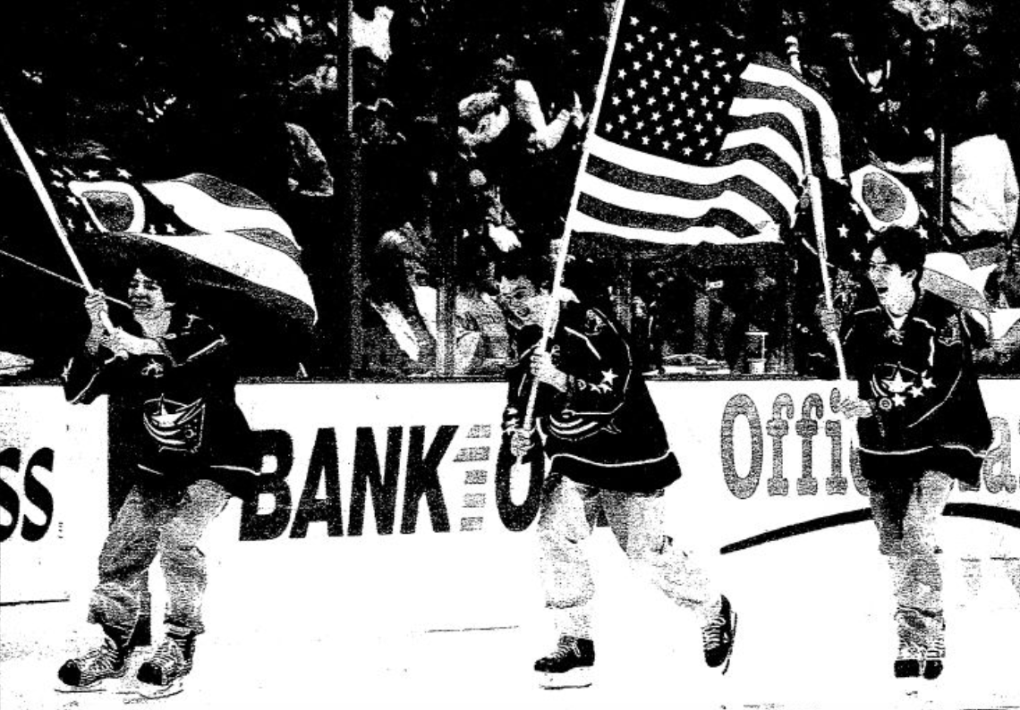 JacketsInsider's tweet photo. In 2003, Trent Vogelhuber was on the Nationwide Arena ice as the team debuted its new third jerseys. In 2007, he was drafted by the #CBJ in his hometown. Now he's an assistant coach for the Jackets. What a hockey life in Columbus. 

(Credit to The Dispatch for the 2003 photo) https://t.co/nt9Exd9A35