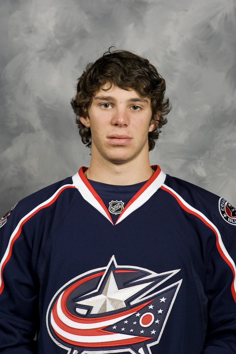JacketsInsider's tweet photo. In 2003, Trent Vogelhuber was on the Nationwide Arena ice as the team debuted its new third jerseys. In 2007, he was drafted by the #CBJ in his hometown. Now he's an assistant coach for the Jackets. What a hockey life in Columbus. 

(Credit to The Dispatch for the 2003 photo) https://t.co/nt9Exd9A35