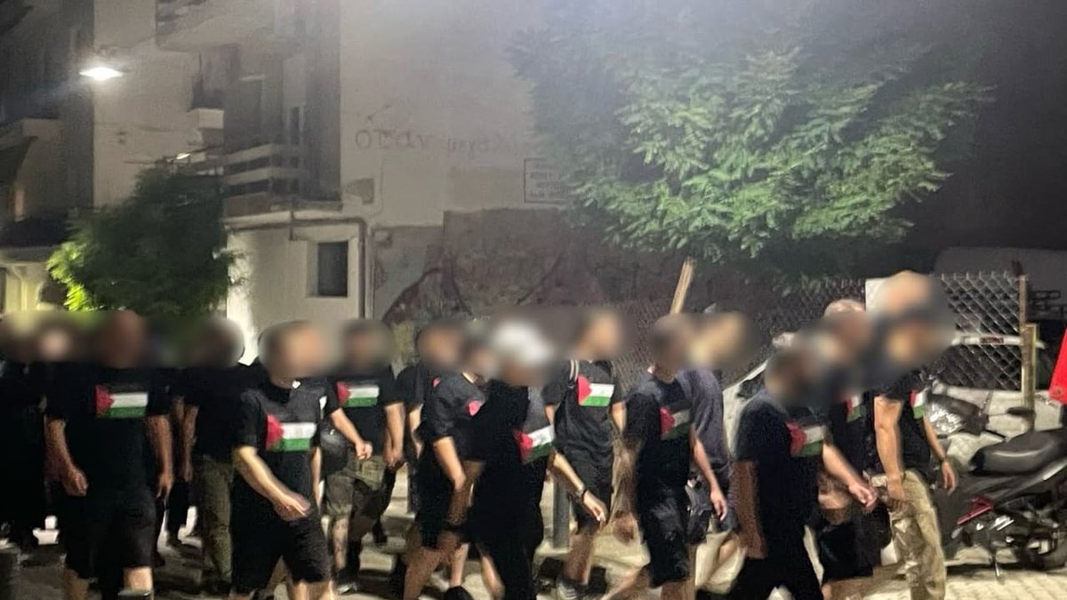 StopAntisemites's tweet photo. Greece: An antisemitic mob wearing Palestinian flag shirts patrolled the town of Kalamaria on what they called an "anti-Zionist patrol."

After the Holocaust, the world promised "Never Again."
The world lied. https://t.co/hoHS9F3PKx
