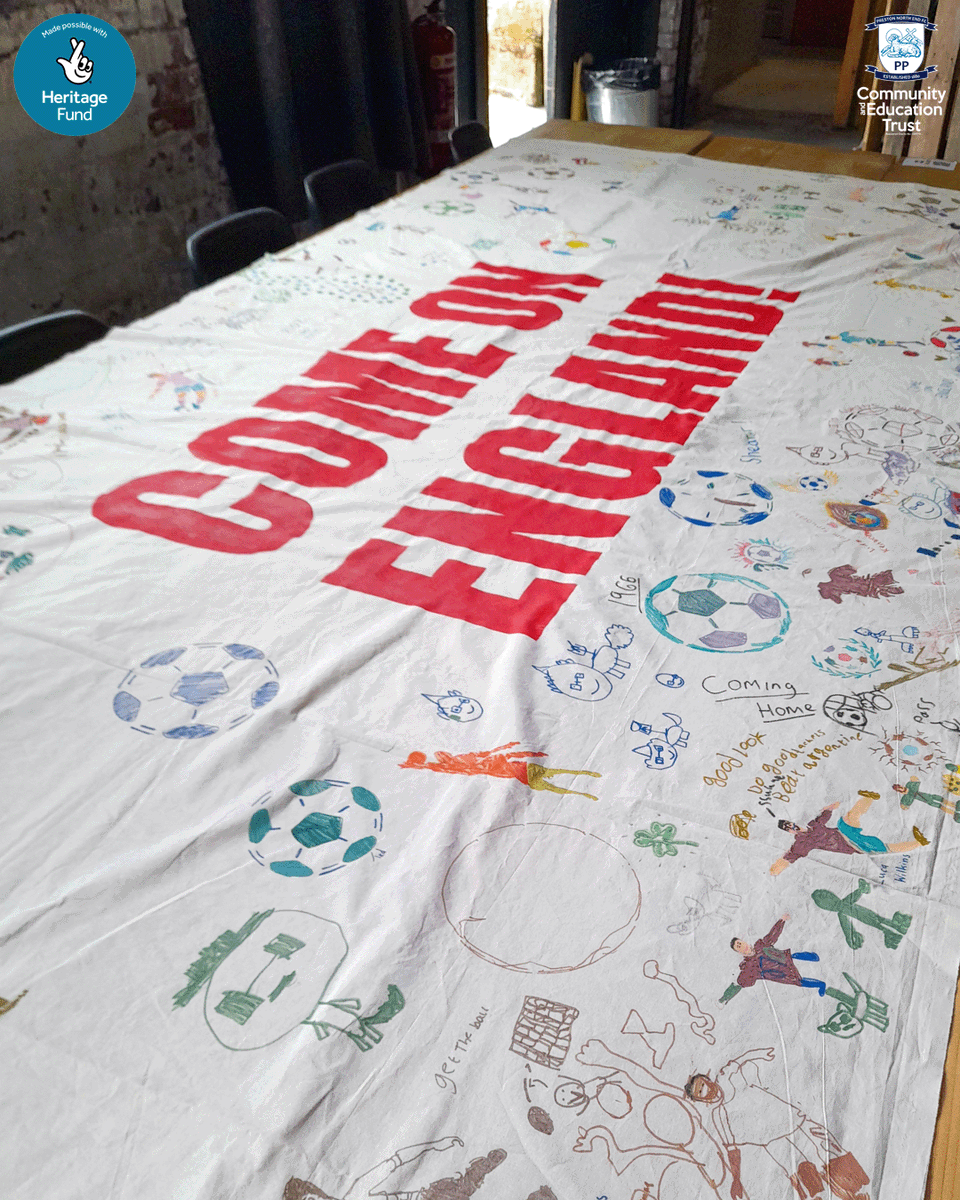 pnecommunity's tweet photo. Recently, we hosted a brilliant World Cup-themed arts and crafts session at Chew’s Yard in Preston. 🤝

Local children and families joined us for a hands-on-history experience, with the chance to learn more about England’s 1966 World Cup story, dress up in a replica England shirt and hold a replica Jules Rimet trophy as well as filling a giant flag with football and World Cup-themed drawings and messages. 🎨

A huge thank you to the National Football Museum for supporting the day and helping bring football heritage to life in the community, and to Chew's Yard for hosting us. 🙌

#PNECET | #pnefc | #NationalLotteryHeritageFund | #PNEHeritage