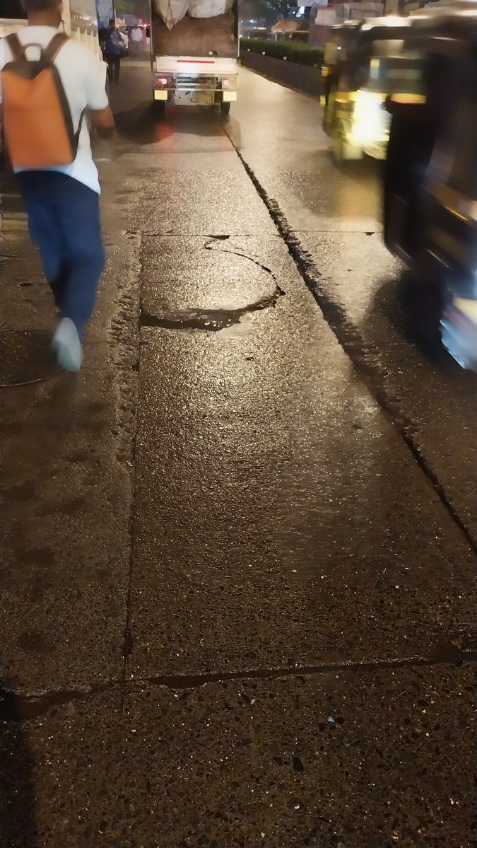zoru75's tweet photo. Hello @mybmcWardRS 

CONcrete Road has sunk 
(Sink hole may be forming)

MG Road, Kandivali W 
going from Dahanukarwadi Metro Station towards Hindustan Naka. Closer to Hindustan Naka. 
Outside Jai Hamuman Electricals - Havells shop 

Kindly check &amp; fix https://t.co/bQyxEotHLK