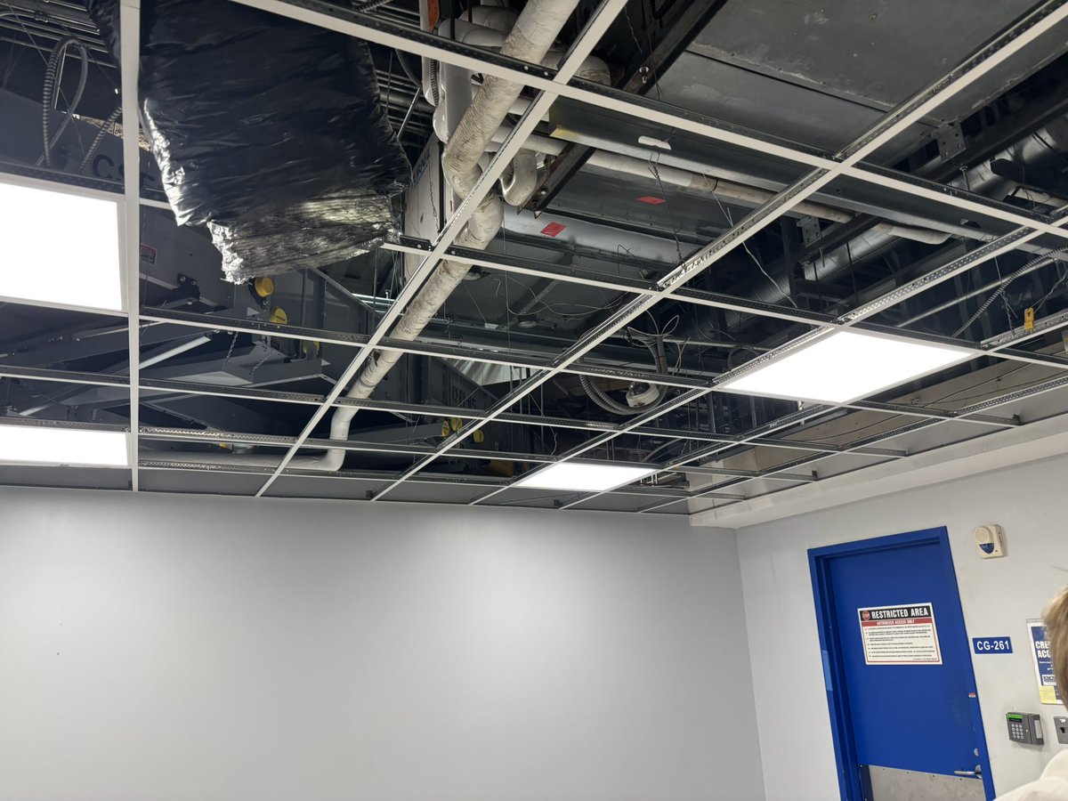 MaryBowdenMD's tweet photo. Just came from prettiest airport in Europe #ParisCDG to this hot, stinky dump in our nation’s capitol. Half the ceiling tiles are missing, carpet is ripped up, AC only works in some areas, and it smells like the subway. @Dulles_Airport is an embarrassment to our country. https://t.co/6a2OUc3Fyw