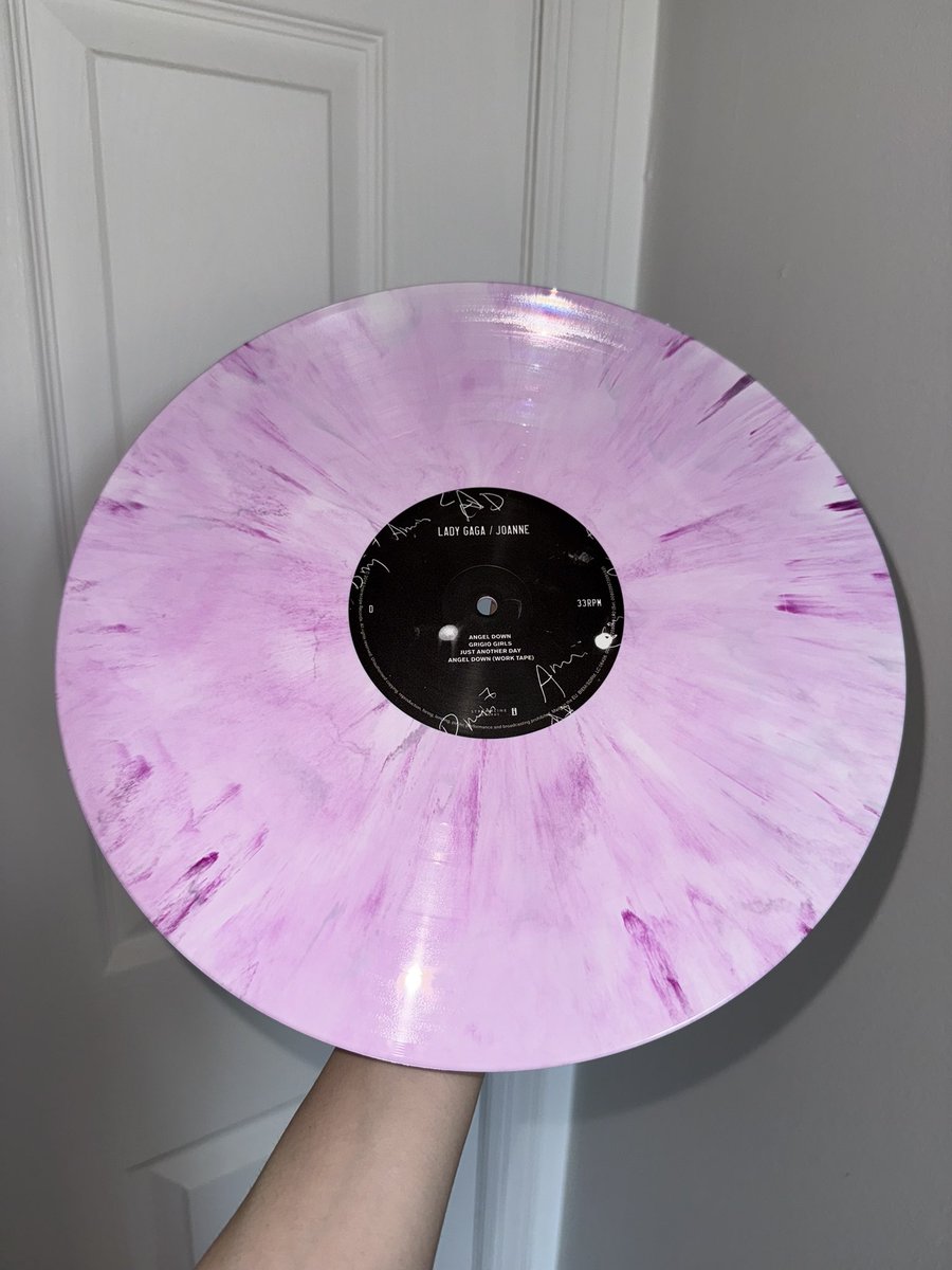 holdmymeatpurse's tweet photo. the pink marble Joanne repressing vs the original from 2016 https://t.co/ZgDxEUOI0E