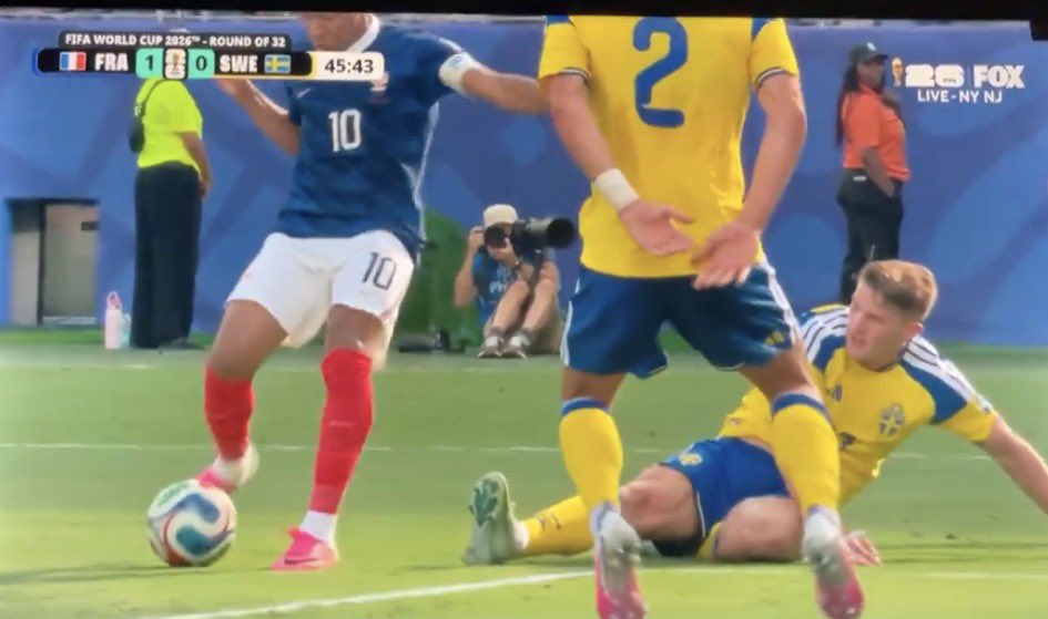 UTD_Seth001's tweet photo. 🚨 Zinedine Zidane on Kylian Mbappé scoring his fifth goal of the 2026 FIFA World Cup to put France 1–0 ahead against Sweden just before half-time:

🗣️ “What a player. What an extraordinary footballer. There are good strikers, there are great strikers, and then there are players like Kylian Mbappé who create goals completely on their own when everyone else sees no space.”

“Watch that goal again. Two defenders in front of him, no clear shooting angle, Viktor Gyökeres trying to recover, bodies everywhere… and somehow Mbappé still finds a way through. One explosive touch, one piece of magic, and then he absolutely smashes the ball into the net. That is not luck. That is world-class quality.”

“This is why he belongs in conversations with the greatest forwards of this generation. The best strikers finish chances. Mbappé creates chances that shouldn’t even exist. That’s the difference. He doesn’t wait for the game to come to him—he forces the game to change.”

“People compare great attackers all the time, but very few possess this combination of pace, intelligence, technique and ruthless finishing. When he decides to attack, defenders aren’t thinking about stopping him anymore—they’re hoping he makes a mistake. Tonight, Sweden found that out the hard way.”

“Five goals already in this World Cup. That isn’t just impressive, it’s the mark of a player determined to carry France all the way. Every time France need something special, Mbappé answers. That’s what separates legends from ordinary stars.”

“The frightening thing is that he still looks hungry. He celebrates, then immediately wants the next goal. That’s the mentality every champion must have. If he continues like this, France will take some stopping.”

{@DailyMail }