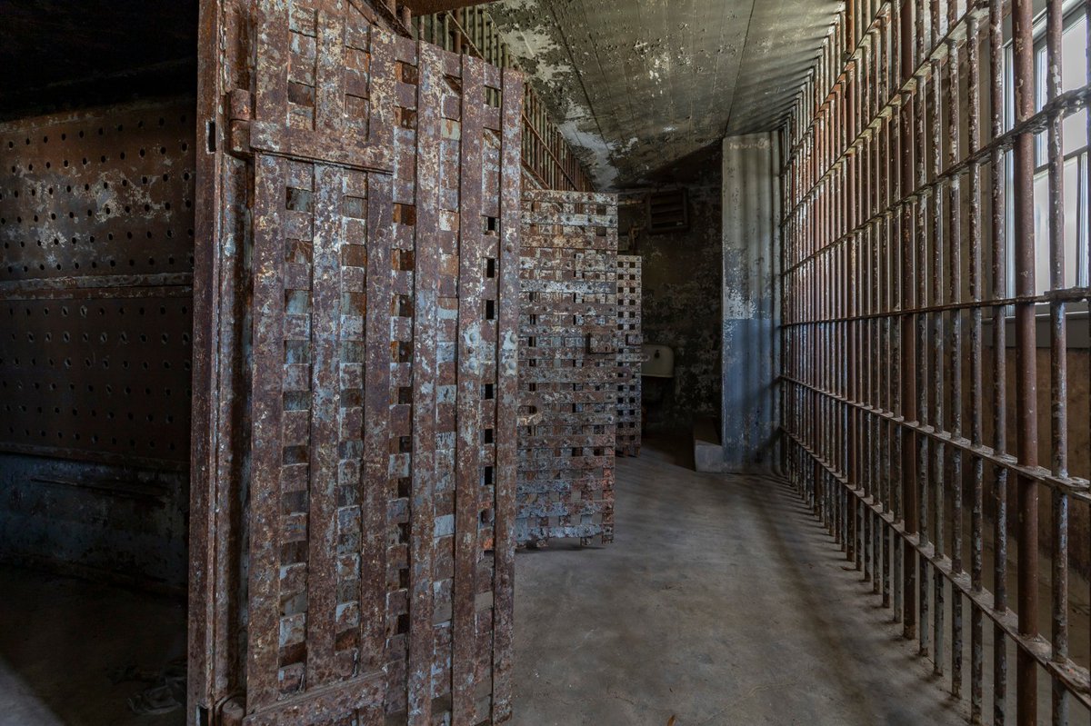MIParanormalYT's tweet photo. The Old Clay County Jail in Green Cove Springs, Florida, was built in 1894 and operated as the county jail until 1972. During its nearly 80 years of service, it housed men, women, juveniles, and even the mentally ill under often harsh conditions. The jail was also the site of seven executions by hanging between 1894 and 1916, leaving behind a dark and tragic history that still fascinates visitors today. The building has since been preserved as part of the Clay County Historical Archives and remains one of the oldest surviving jails in Florida.

Many believe the jail's violent past has left an imprint on the building. Visitors and paranormal investigators have reported hearing unexplained footsteps, disembodied voices, loud bangs, cell doors moving on their own, shadow figures, and an overwhelming feeling of being watched. The jail has even been featured on the TV show Ghost Hunters, adding to its reputation as one of Florida's most haunted historic locations. Whether you believe in the paranormal or not, the Old Clay County Jail is a chilling reminder of the lives—and deaths—that unfolded behind its thick brick walls.