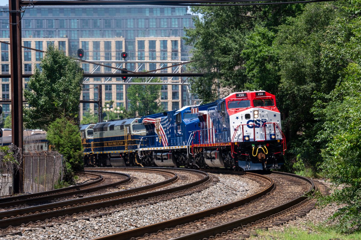 Trainspotters line up for a photo of the new @CSX 250th ...