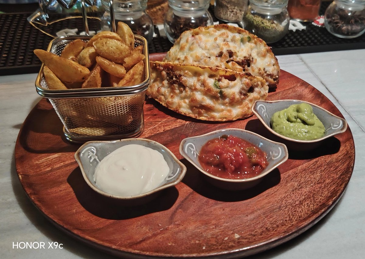ngoni_kato's tweet photo. Taking a moment to unwind and enjoy some excellent cheesy tacos tonight. ๐ฏ
#TacosTuesday https://t.co/432gt8xzFl