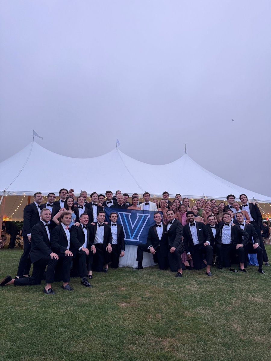 CoachJayWright's tweet photo. Father Peter lead the way for a fired up villanova Crowd at the Hyzy - Barroqueiro wedding in Newport RI. Miranda Barroqueiro (School of Nursing ‘21) and Chris Hyzy (VSB ‘21) tied the knot !  Congrats to the newlyweds !! Go Cats ! @VillanovaAlumni https://t.co/31HAlSorjf