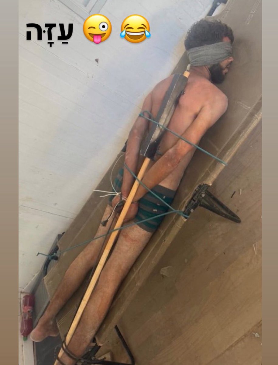 Parodyjeffx's tweet photo. THIS IS HORRIFYING 🚨✡️ 

The IDF itself proudly shared footage showing an unarmed Palestinian man from northern Gaza blindfolded and strapped to a stretcher. 

Crimes against humanity. https://t.co/rKJkpeq291