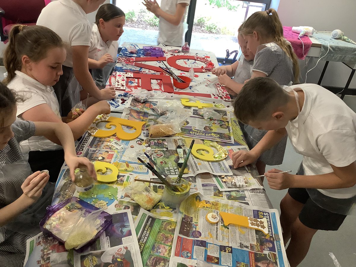 StJohnsThornham's tweet photo. A second day working with The Fairy God Mum, Wendy who is working with the children to create a wall mural in the hall with a jewelled cross centrepiece surrounded by sparkly letters spelling out our ethos statement and school values. Can’t wait to see it finished! https://t.co/A1rrp2bWP9