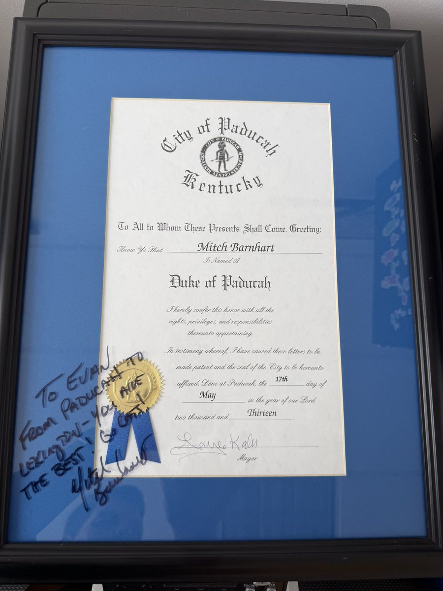 EvanCraneKY's tweet photo. Mr. B’s last day. 

From volunteer student to intern to full time, he always made me feel valued, part of the team. A great college administrator and elite human being. 

A legacy that will impact generations. 

(He let me keep his Duke of Paducah plaque.) https://t.co/a32I5L2bGi