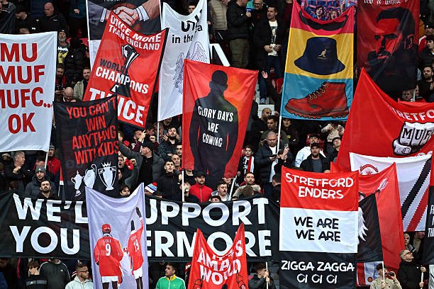 Guerrilla33's tweet photo. TRA Stretford End Flags https://t.co/wMiikl3RSN