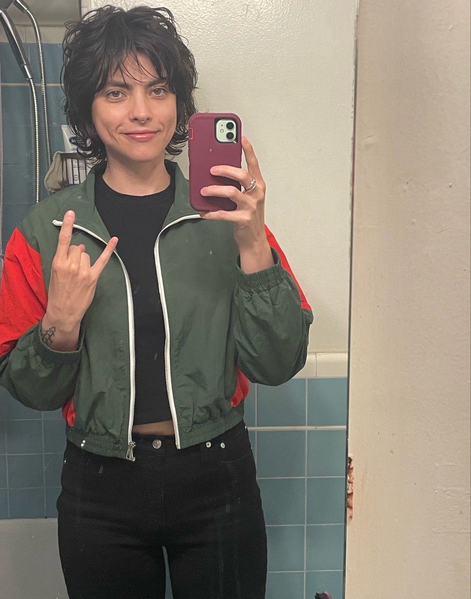 lalavin666's tweet photo. I hope this picture of me wearing a cool jacket induces you to buy my book The Third Beat or to kick over a delivery robot or perhaps to request my book The Third Beat from your local bookseller https://t.co/4R5N4ENJQJ