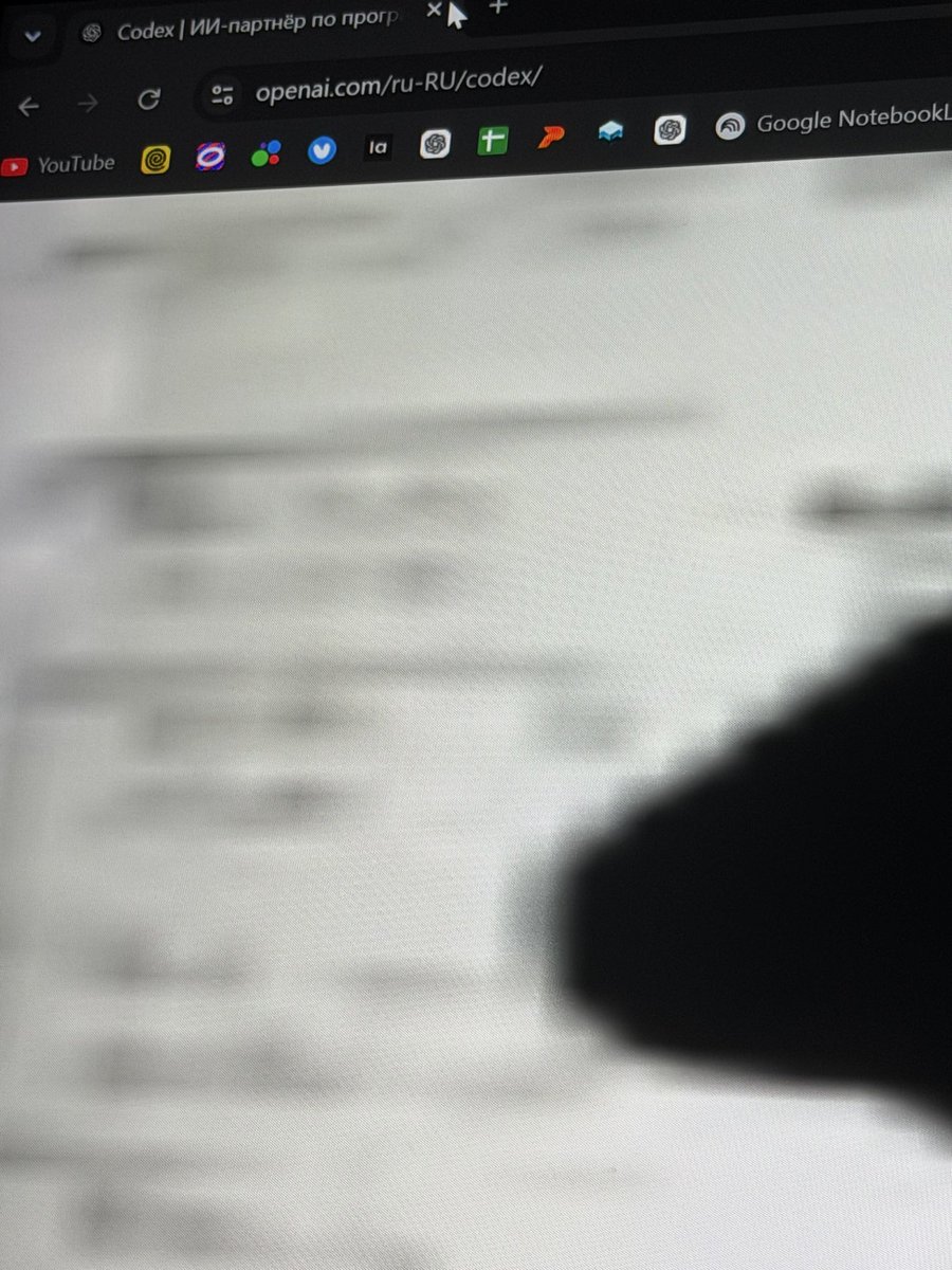 vezmenov's tweet photo. I swear this isn’t fake.

While browsing https://t.co/Uyvo79rfDM, this face suddenly appeared on the page for a moment. I couldn’t reproduce it afterwards.

Was this just a rendering bug, or has anyone else seen it? @OpenAI @OpenAIDevs @thsottiaux https://t.co/cRocZBojTn