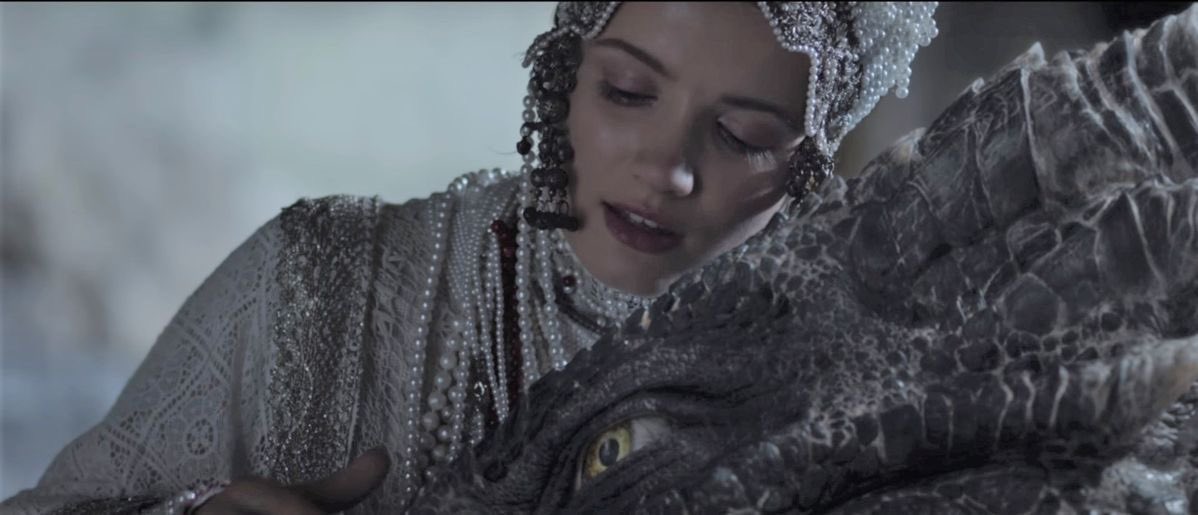 BluebellRaven's tweet photo. I Am Dragon or The Dragon inside me, is a 2015 Russian fantasy film about Princess Miroslava, who is abducted by a dragon during her wedding and taken to a remote island. 

She discovers the beast can transform into a human named Arman, and she eventually falls in love with him. The movie was directed by Indar Dzhendubaev.