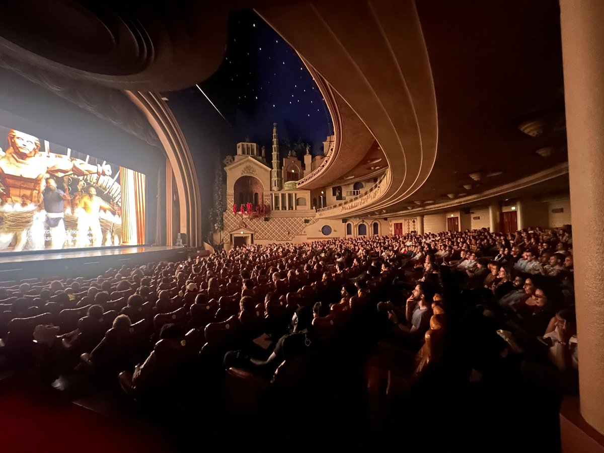 RRRMovie's tweet photo. Amidst a major football match between France and Sweden, we still got a massive audience turnout for the #RRRMovie screening at the @LeGrandRex, Paris. 🇫🇷

The response? As explosive as ever. 4 years since release and nothing has changed. 🔥

THE FILM THAT LASTS FOREVERRR. https://t.co/VG3tUrXcqj
