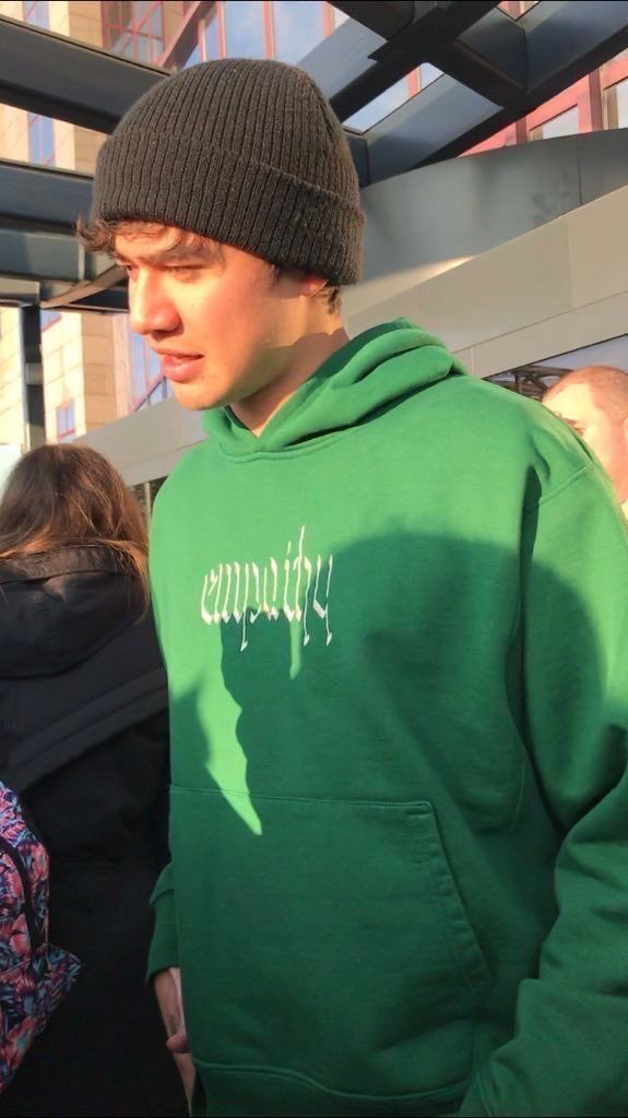 CLOSERTOTHESOS's tweet photo. i think as a society we moved on from calum in the green empathy hoodie too fast. i need cal to bring it back https://t.co/sowCMwPKK0