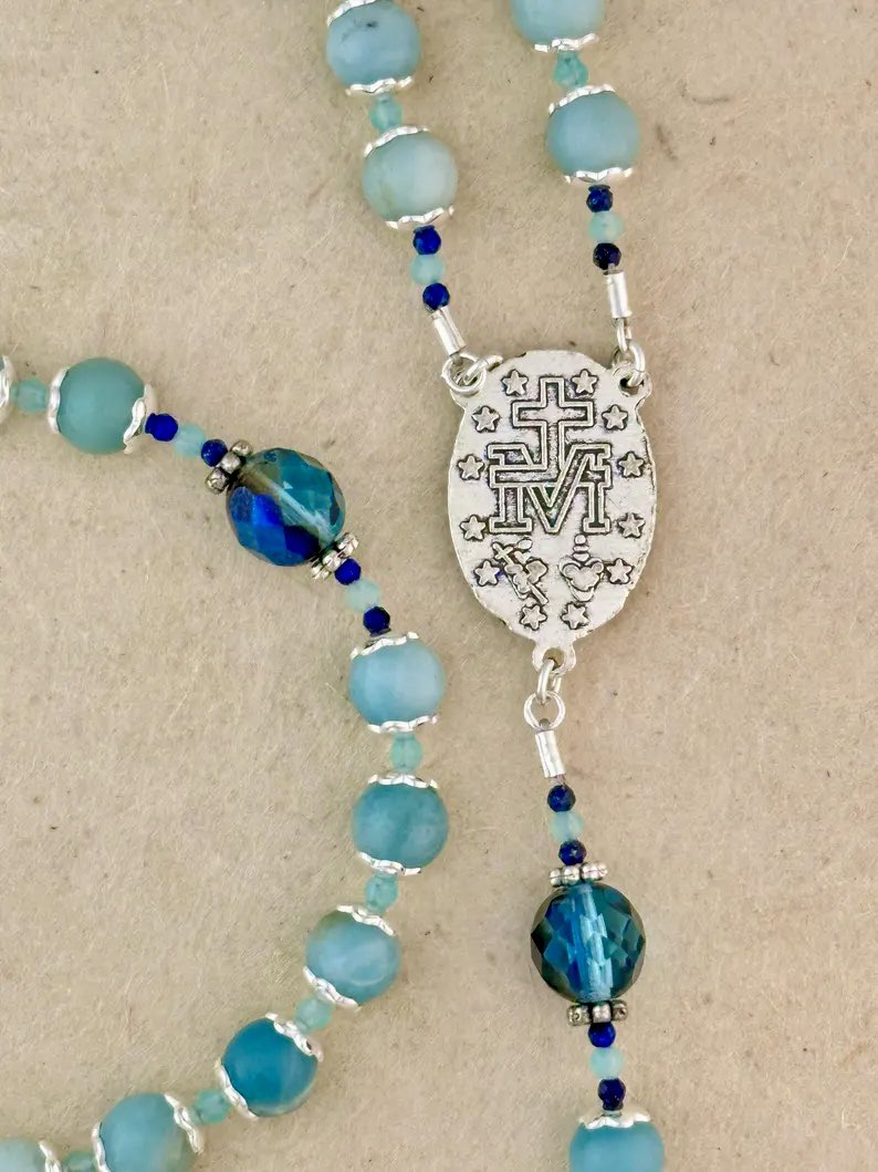 BreeSolstad's tweet photo. I handcrafted this beauty today as a prayer for the unity of the Church. I even prayed with it.

It’s Amazonite, Fire-Polished Glass, Lapis Lazuli and The Miraculous Medal.

May it bring you great graces when you pray it in your home. 🙏

Link: https://t.co/z4EzRjKnUH https://t.co/l4toZ8KHka