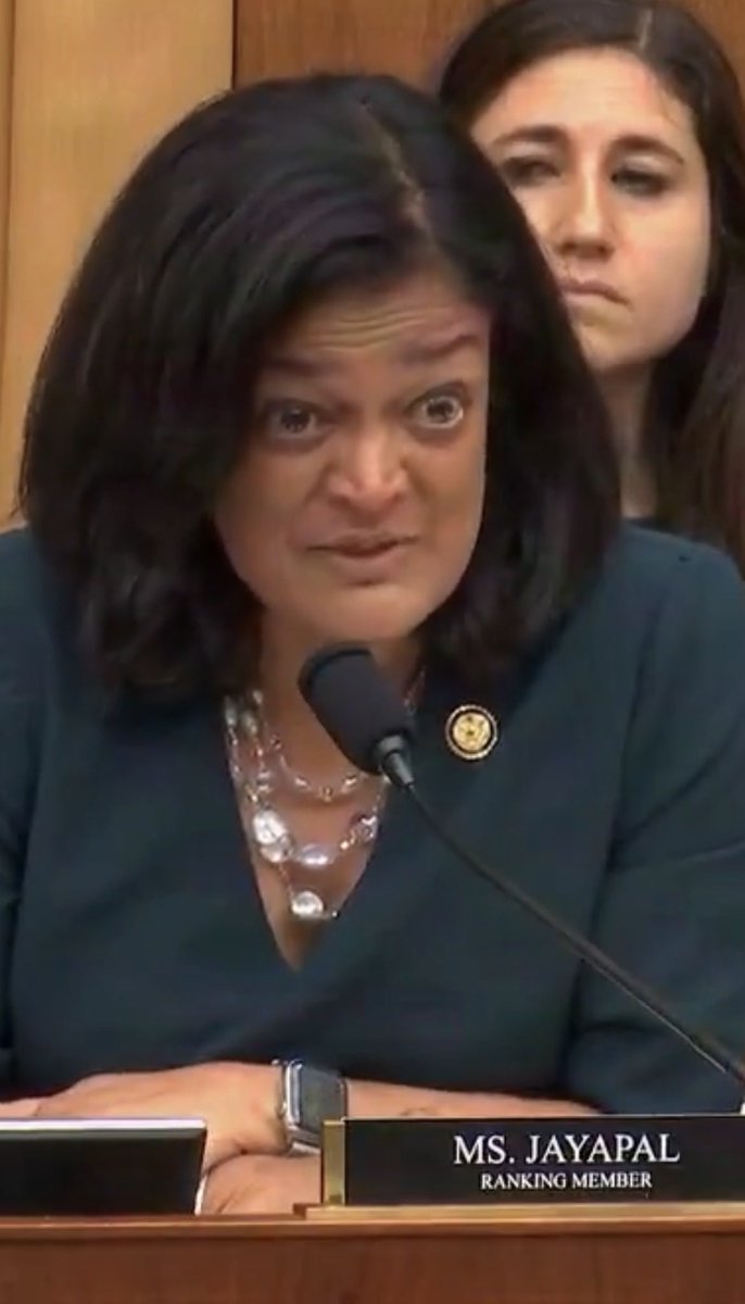 TeaPartyPDX's tweet photo. Imagine being hateful enough to sit in a position in Congress and cast this look down upon a grieving American mother who lost her daughter to a preventable act of violent murder inflicted by an unvetted migrant who entered into USA and was shielded by  “sanctuary” policies pushed by the party of open borders. It’s not compassion. It’s hateful, welcomed decline - and Pramila Jaypal has not a drop of compassion or reason within her. She is not for protecting Americans or our way of life. All she cares about is advancing herself and trafficking people in to change our culture and to receive votes and support from radical Marxist activists. Pramila Jayapal will never care how these policies affect us- no matter how destructive the fall out becomes.