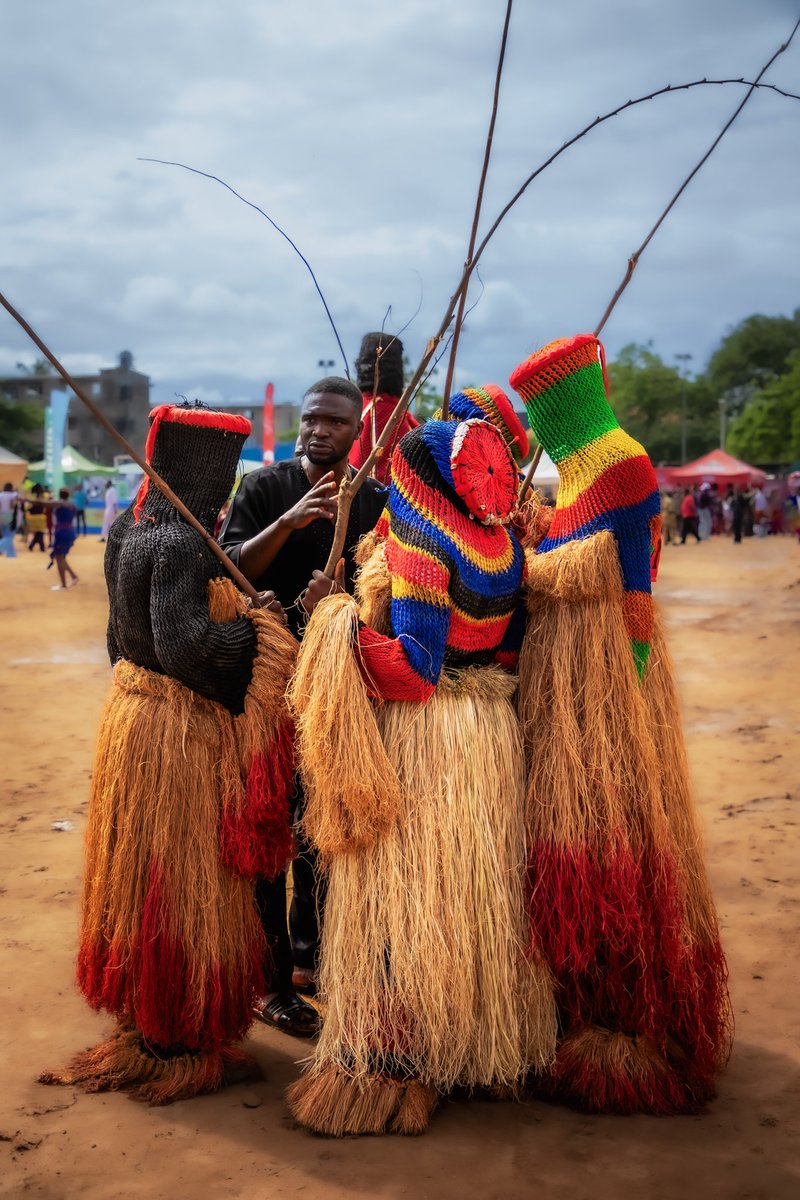 Owusi's tweet photo. Gathering of the Spirit and human.
In the quiet space between tradition and modernity, the spirits gather—not merely as masked figures, but as living symbols of ancestry, identity, and collective memory. Captured in a rare moment of stillness #lagosigbohangout2026 #IgboAmaka https://t.co/haeqTXWuyM
