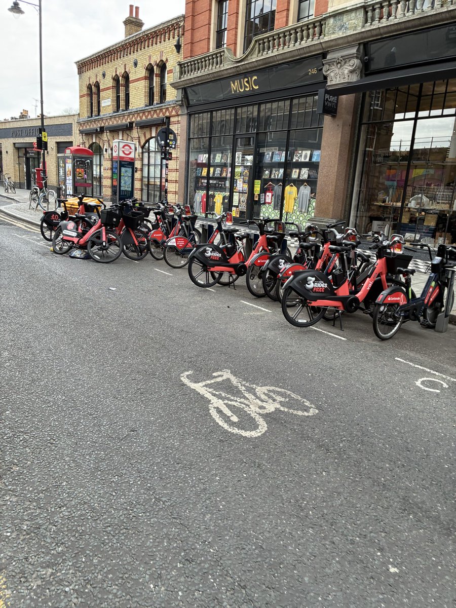 ButteryMark's tweet photo. @voitechnology @TfL @Lambethgp @LambethLabour @lambeth_council @survivinglambet voi bikes are blocking the tfl Docking stations and road on Ferndale Road. Please do something https://t.co/rqduz7rmuz