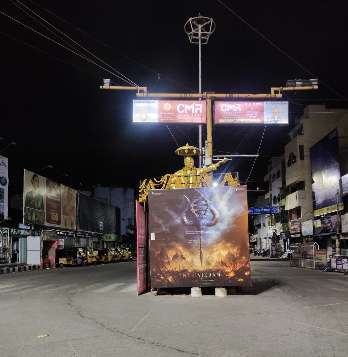 NtrMaruthi9999's tweet photo. Demi GOD @tarak9999 Anna 🙌🏻 #NTRxTrivikram announcement poster in Tirupati 🦚🔥 https://t.co/8kuC66ScuI