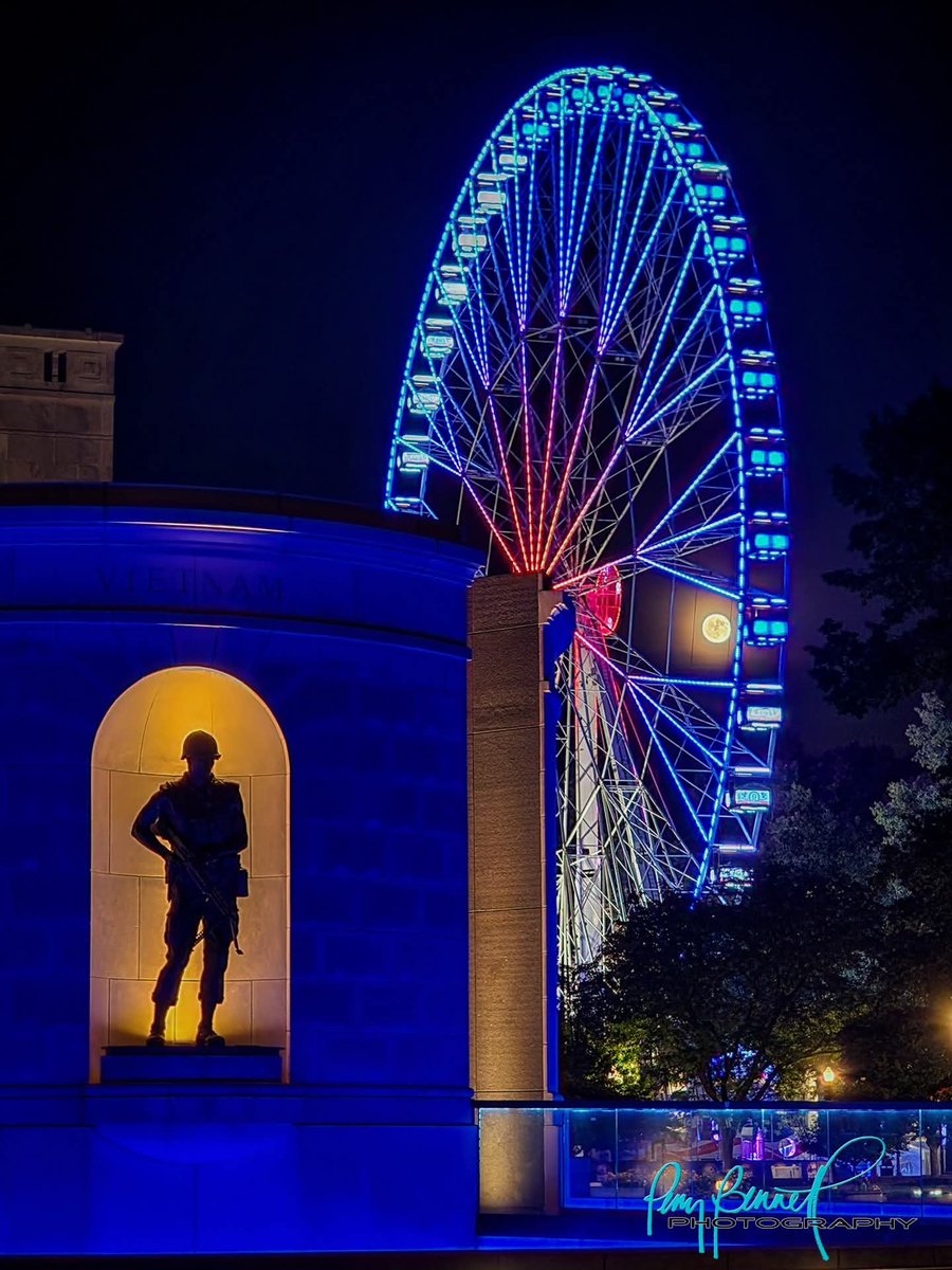 PerryB_Photo's tweet photo. The full #StrawberryMoon rises within the America250 Wheel [the largest mobile Ferris wheel in the WORLD!] behind the West Virginia Veterans Memorial on the grounds of the #WVCapitol. June 30, 2026. #WestVirginia #America250Wheel #America250 https://t.co/5BpCFRFhJP