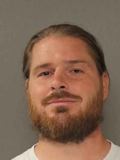 MAGAts_Exposed's tweet photo. Meet MAGAt John Daniel Andries, a Marine Corps veteran from Maryland and violent J6 insurrectionist. He was heavily publicized because he had previously served from 2006 to 2009 as a crew chief in the prestigious Marine One squadron, the helicopter unit responsible for transporting the President of the United States.

On January 6, 2021, Andries was among the first wave of rioters to breach the Capitol building, entering through a broken window near the Senate Wing door. Surveillance and cell phone videos showed him fueling the mob, approaching Capitol Police officers within inches, and refusing to leave until he was physically dragged away. On August 23, 2022, Andries pleaded guilty to a felony charge of obstruction of an official. He was subsequently sentenced to one year and one day in federal prison.

While on pre-trial release in March 2022, he was arrested in Maryland for disorderly conduct and assaulting a police officer while intoxicated.

In June 2025, Andries was convicted of two counts of violating a peace order (similar to a restraining order) for repeatedly stalking and following the mother of his child. He was sentenced to 60 days in jail and three years of unsupervised probation for these offenses.