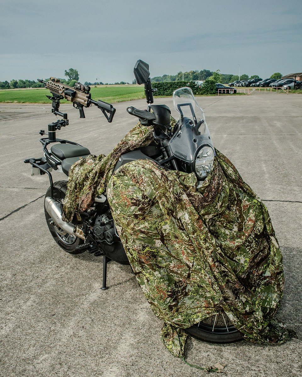 TheDeadDistrict's tweet photo. An FN EVOLYS 5.56 machine gun mounted on a motorcycle. https://t.co/e6Qvd2Y7zX