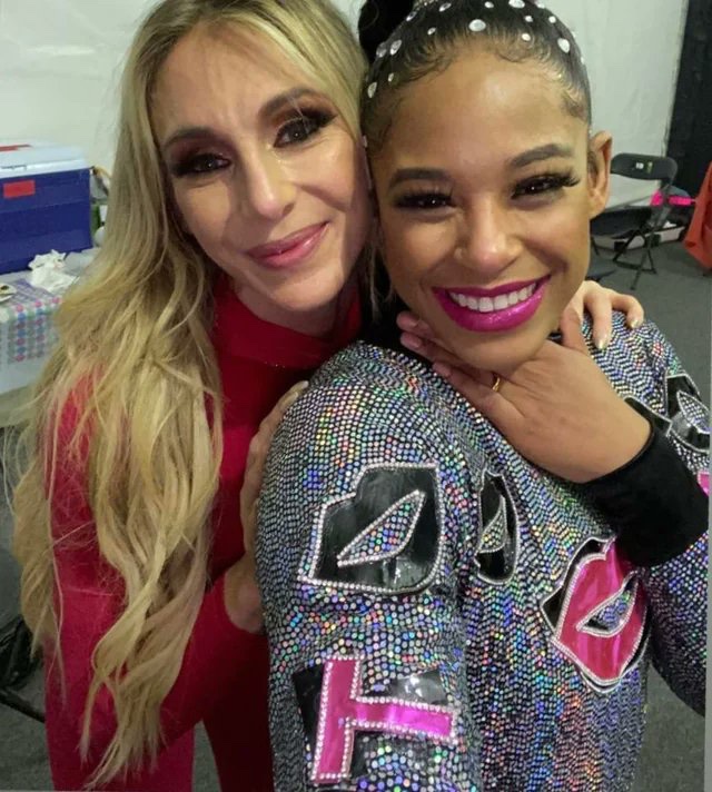WrestlingWCC's tweet photo. Charlotte Flair gifted a pair of Jordans to Bianca Belair and Montez Ford for their son 🎁 https://t.co/CcK2VDv4rx