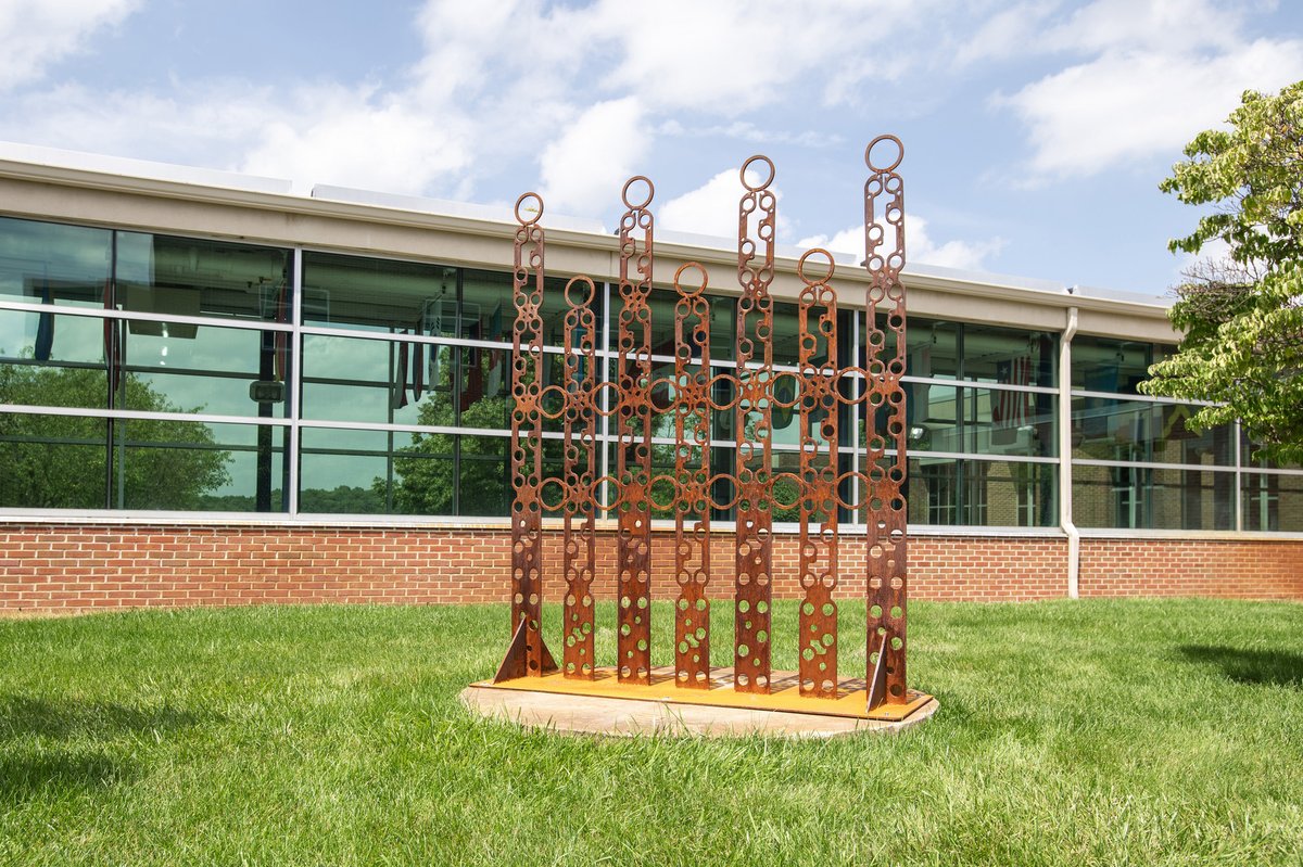 Kellogg_CC's tweet photo. Among the many new sculptures installed on KCC campuses this summer as part of the College’s continuing Triennial Outdoor Sculpture Exhibition is “Hidden Reinforcement” by Susan Sieklucki of Kalamazoo!

The repurposed steel with iron oxide patina sculpture is on display now between the library and Ohm Information Technology Center on campus in Battle Creek, and will be on display to the public for free for the next three years.

Go Bruins!
