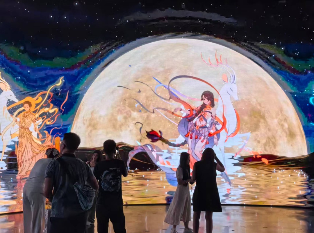 XuhuiShanghai's tweet photo. At TANK Shanghai, Fei Ren Zai wraps a former fuel tank in a 12-metre character display. Inside, a 6.5-metre-high 360-degree projection space, original drawings and interactive scenes bring the Chinese comic into full scale. Through July 20. https://t.co/Z9qUom25GI