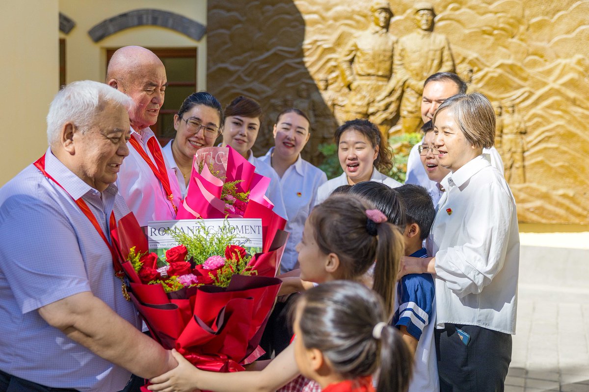 XinjiangBuzz's tweet photo. 🎉People across China's #Xinjiang are celebrating the 105th founding anniversary of the Communist Party of #China. #PathToGlory https://t.co/rDPtDcoxKY