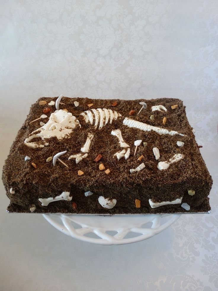 daily_dolce's tweet photo. This dinosaur skeleton cake is amazing https://t.co/V02Xa9Vd9F